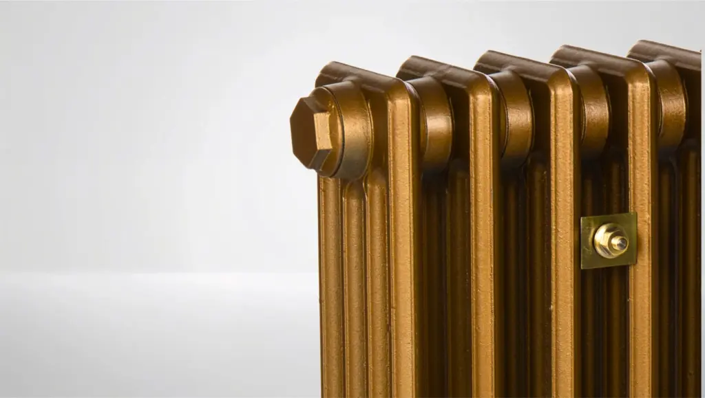 Restored Victorian four-column cast iron radiator — column detail